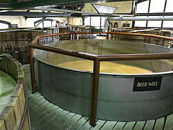 The photo shows the Beer Well Tank of the American Four Roses distillery.
