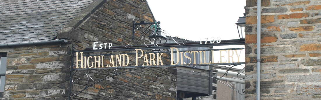 The Highland Park sign at the entrance