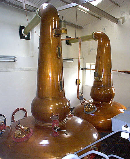 The pot stills inside the distillery.