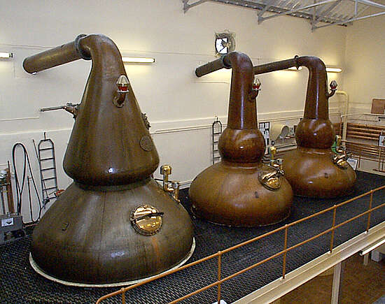 The pot stills inside the distillery.