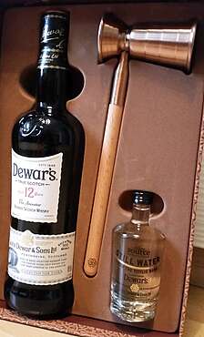 Dewars with Pure Pitilie Burn Water from the Scottish Highlands and a Measure for the Perfect Serve