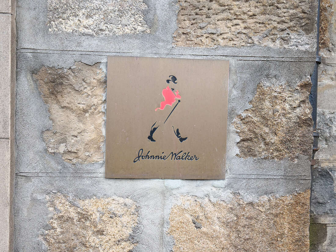Johnnie Walker sign on an exterior wall